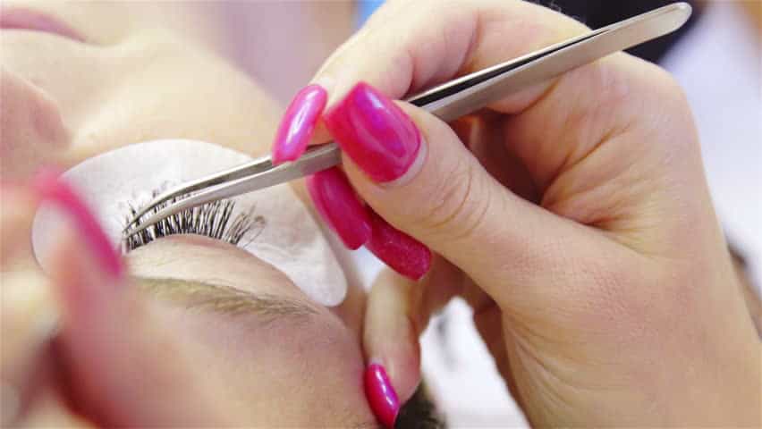 Use a tweezer instead of your acrylic nails